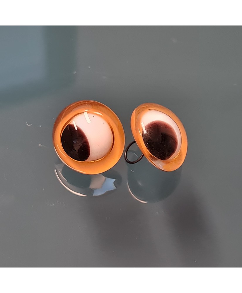 ANTIQUE SQUINTING GLASS EYES